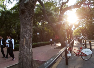Image of pedestrians and eco-bici stand